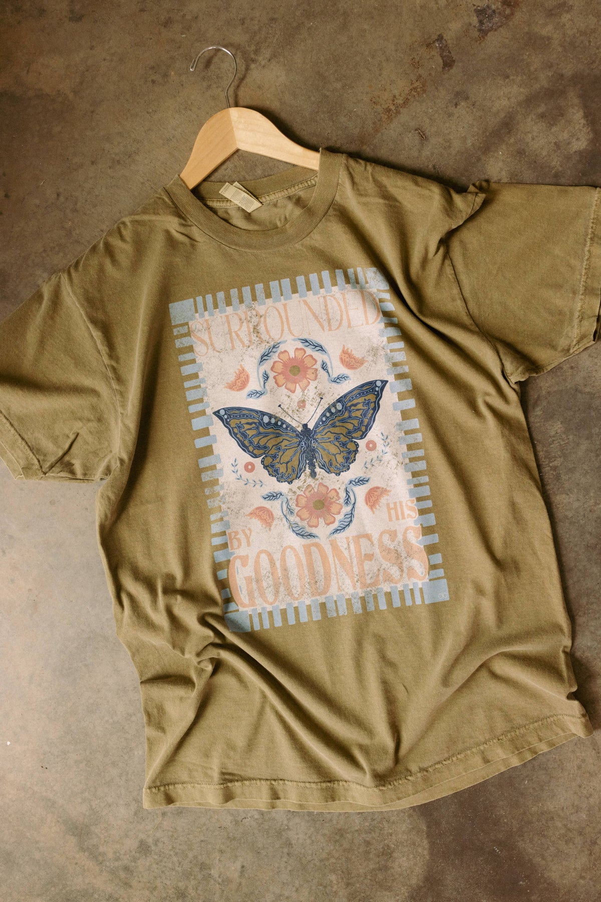 SURROUNDED BY HIS GOODNESS GRAPHIC TEE