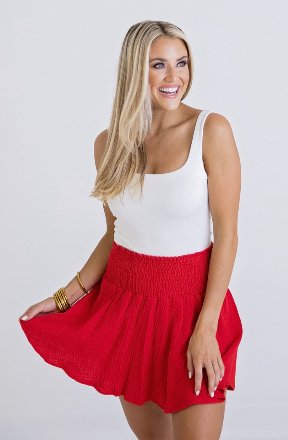 RED SMOCKED SKORT