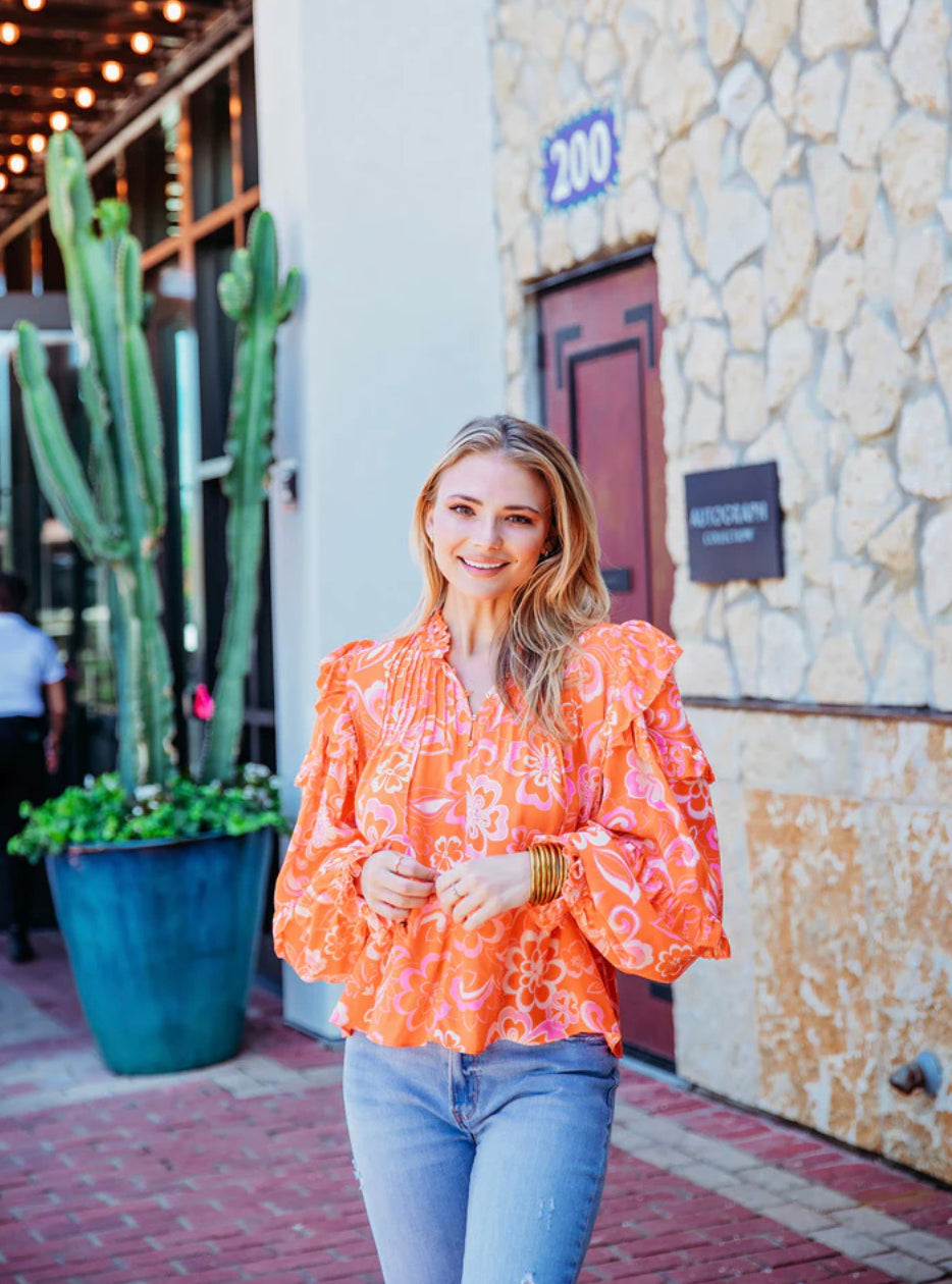 ORANGE FLORAL RUFFLE SLV TOP